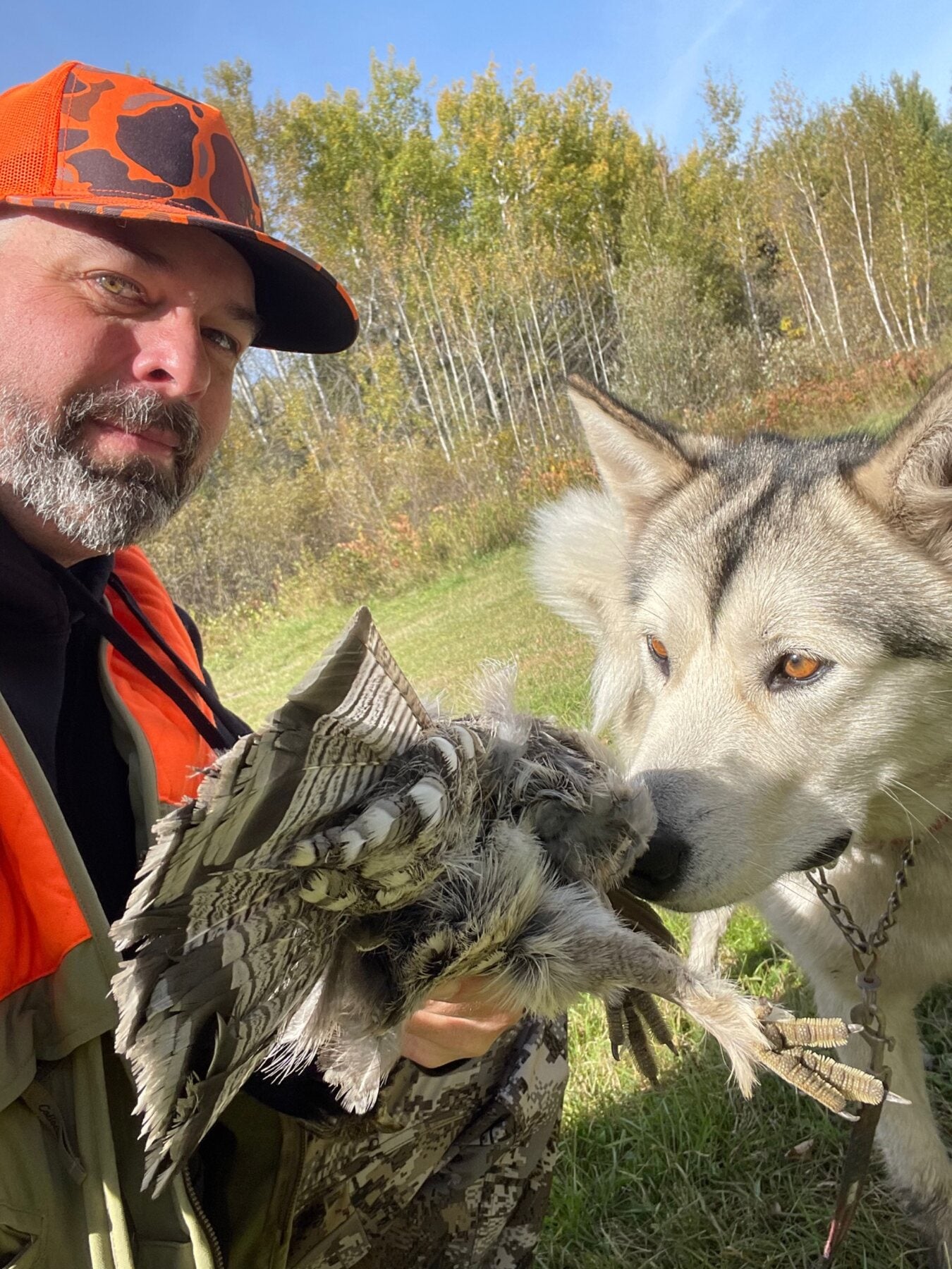 Jarred and Koda after a grouse hunt in Northern Minnesota